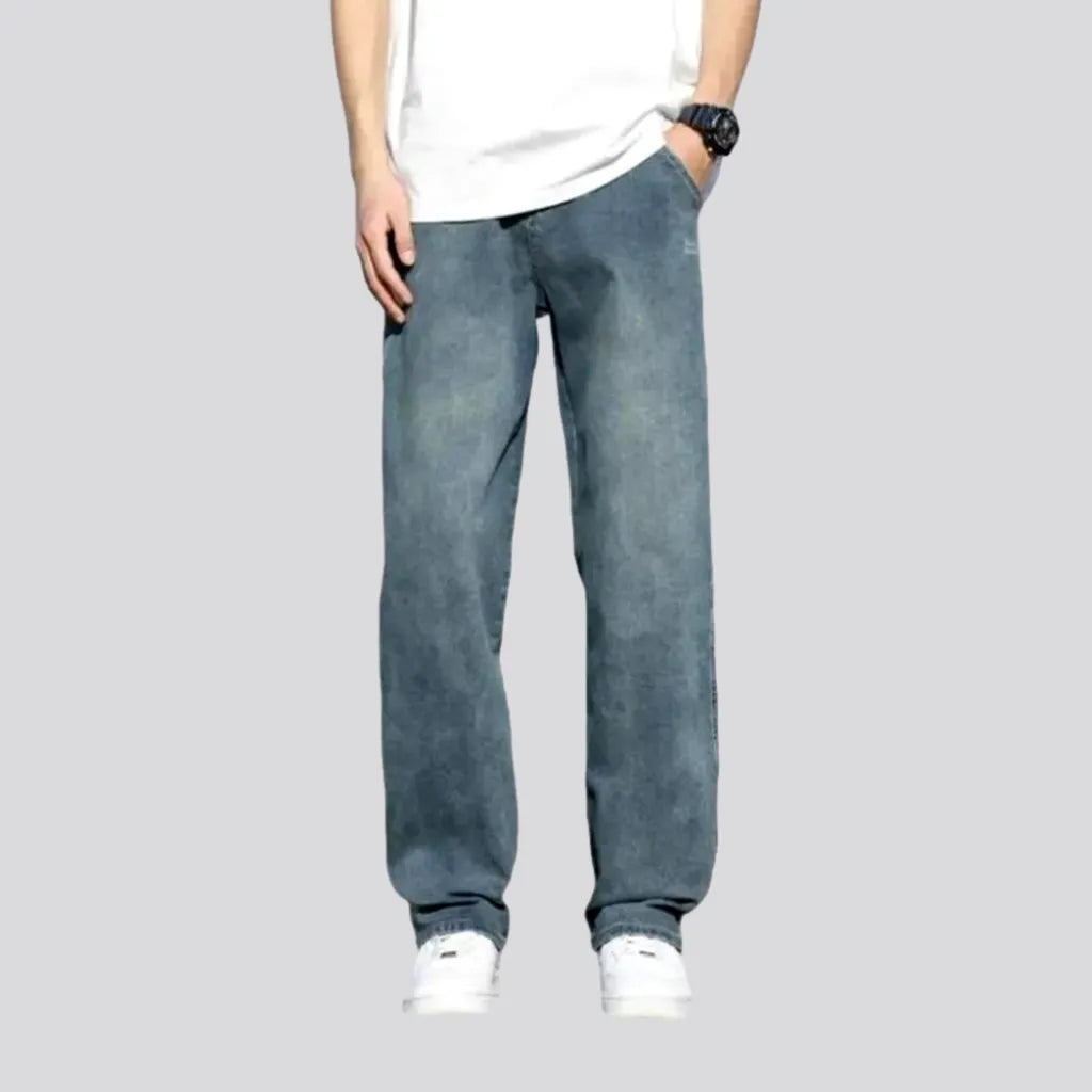 Stonewashed men's floor-length jeans