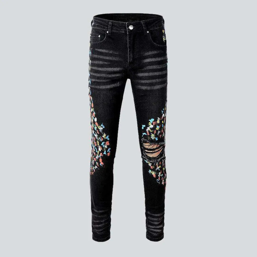 Multicolor stains painted men's jeans